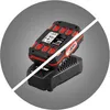 A battery and charger for a power tool, with a diagonal line overlay suggesting it is sold without the battery and charger. Produktbild-Vorschau