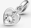 A silver heart-shaped charm with an infinity symbol and the word "FRIENDS" engraved on it. Podgląd zdjęcia produktu