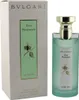 Grün-weiße Box mit goldener Blüte neben mintgrünem Glasflakon mit goldener Kappe, Aufschrift „Eau Parfumée au thé vert“. Produktbild-Vorschau