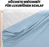 A light blue fitted sheet is draped over a white mattress. Produktbild-Vorschau