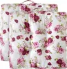Two square seat cushions with a floral rose pattern are shown side-by-side. Produktbild-Vorschau