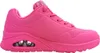A studio shot of a single pink sneaker against a white background. Voir les images du produit