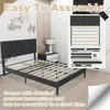 A bedroom scene with a bed frame and assembly instructions. Produktbild-Vorschau
