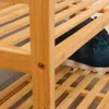 A close-up view of a wooden shoe rack with a blue shoe on one of the shelves. Podgląd zdjęcia produktu