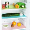 Inside a refrigerator, showing shelves with food items and refrigerator liners. Produktbild-Vorschau