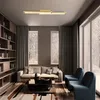 A modern living room with a large window overlooking a snowy landscape, featuring a sofa, chairs, a coffee table, and a bookshelf. Produktbild-Vorschau