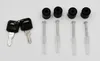 A collection of small hardware items, including keys, rubber feet, and screws with wall anchors, arranged on a white background. Náhled obrázku produktu