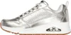 A side view of a silver sneaker with a white sole and brown outsole. Voir les images du produit