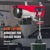 An electric hoist is mounted on a bar above a car with its hood open, in what appears to be a garage or workshop setting. Voir les images du produit