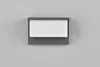 A modern, rectangular outdoor wall light with a dark gray frame and a white diffuser, mounted on a plain light gray wall. Podgląd zdjęcia produktu