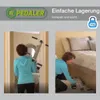A collage showing a woman using a foldable exercise bike indoors, with one image showing it being stored under a bed. Produktbild-Vorschau