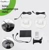 A flat lay of solar-powered hanging lamps and their accessories, including a solar panel, remote control, and mounting bracket. Produktbild-Vorschau