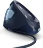 A dark blue steam generator iron base with a transparent water tank and a dark blue hose attached, shown from a three-quarter angle on a white background. Produktbild-Vorschau