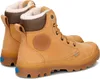 A pair of tan Palladium boots with white fur lining, shown from a rear-diagonal angle on a white background. Produktbild-Vorschau