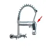 A chrome kitchen faucet with a pull-out spray nozzle and a coiled hose, mounted on a wall. Podgląd zdjęcia produktu