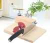 A kitchen counter with a meat slicer and some sliced meat. Náhled obrázku produktu