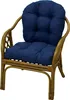 A close-up studio shot of a rattan chair with a blue cushion. Produktbild-Vorschau