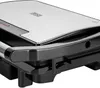 A close-up, angled view of a closed panini grill. Produktbild-Vorschau