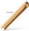 A pair of bamboo tongs is shown diagonally against a white background. Náhled obrázku produktu