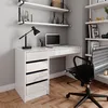 A modern white desk with drawers and a laptop, set against a light gray wall and a wooden floor. Produktbild-Vorschau