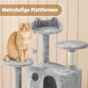 An orange cat sits on a multi-level cat tree with scratching posts and platforms. Produktbild-Vorschau