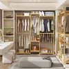 A well-organized closet with a wooden clothing rack, shelves, and various clothing items and accessories. Produktbild-Vorschau