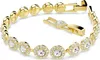 A gold-colored bracelet with clear stones, shown on a white background. Anteprima dell’immagine prodotto