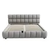 A gray upholstered bed frame with a slatted mattress support system is shown against a white background. Anteprima dell’immagine prodotto