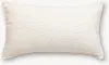 A plain, rectangular pillow with a textured, fluffy surface. Anteprima dell’immagine prodotto