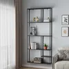 A black metal shelving unit with various items displayed on its shelves, placed against a light gray wall next to a sheer curtain. Anteprima dell’immagine prodotto