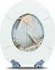A white toilet seat with a decorative image of two starfish on a light blue, textured background. Produktbild-Vorschau