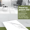 A modern living room with white marble-look flooring and a stylish chair. Produktbild-Vorschau