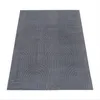 A gray rug with a geometric arch pattern is shown from a slightly elevated angle against a white background. Anteprima dell’immagine prodotto