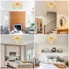 Collage of four interior design scenes showcasing a golden ceiling lamp in different rooms. Náhled obrázku produktu
