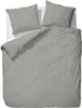 A top-down view of a grey duvet and two grey pillowcases laid out on a white surface. Produktbild-Vorschau