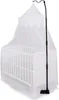 A white baby crib with a white canopy and a black mosquito net stand. Anteprima dell’immagine prodotto