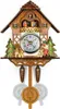 A decorative wooden cuckoo clock with figures and a pendulum. Náhľad obrázku produktu