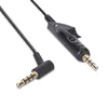 A close-up shot of a black audio cable with gold connectors. Produktbild-Vorschau