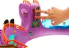 A hand is shown interacting with a toy skateboard park. Náhled obrázku produktu
