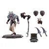 A collection of action figures and accessories, including a main figure with a bear head, a weapon, and other smaller accessories, laid out on a white background. Produktbild-Vorschau