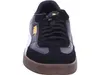 A front view of a black Puma sneaker with white accents and a brown sole. Voir les images du produit
