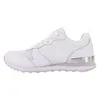 A side view of a white Skechers sneaker. Voir les images du produit