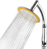 A close-up shot of a shower head with water spraying from it. Produktbild-Vorschau
