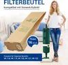 A woman stands next to a vacuum cleaner and a large filter bag, with a living room setting in the background. Produktbild-Vorschau