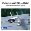 A security camera mounted on a wall during a rain shower. Produktbild-Vorschau