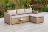 An outdoor lounge set on a patio with plants in the background. Produktbild-Vorschau