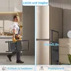 A split image showing a man carrying a folded ladder on the left and a standing ladder next to a refrigerator on the right. Voir les images du produit