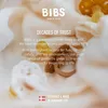 A marketing image for BIBS pacifiers, featuring text about the brand's history and values, with pacifiers in the foreground. Produktbild-Vorschau