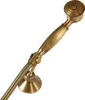 A vintage-style handheld shower head with a flexible hose and wall mount, presented against a white background. Náhled obrázku produktu