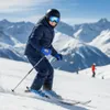 A person skiing down a snowy mountain slope on a sunny day. Produktbild-Vorschau